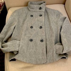 Unique blazer with purple lining.